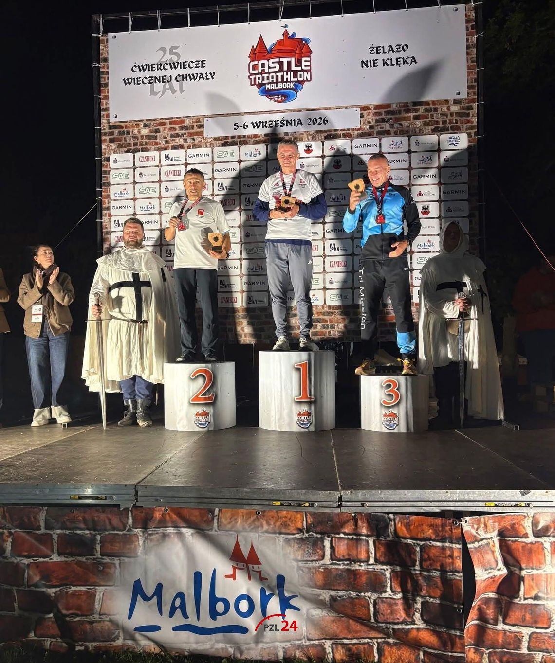 Andrzej Żujew z medalem Mistrzostw Polski w triathlonie